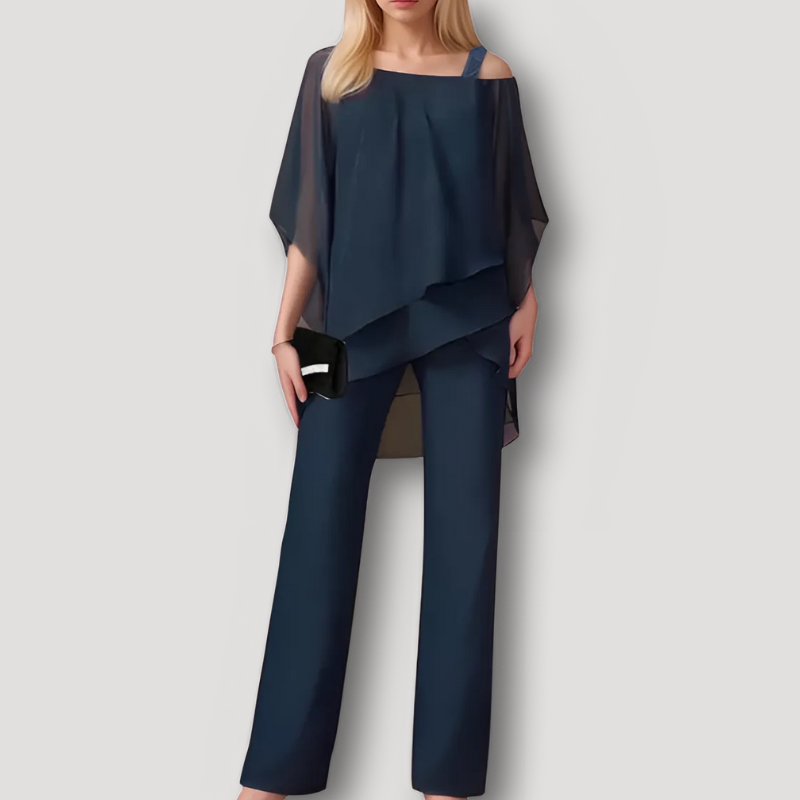 Damen Abendset in Dunkelblau, elegant und schick, bestehend aus fließendem Oberteil und Hose. Perfekt für stilvolle Anlässe und Events.