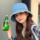 Damen Bucket Hat aus Baumwolle, blau, ideal für Sommer, Strand und Reisen. Modischer, umkehrbarer Fischerhut für vielseitigen Stil.