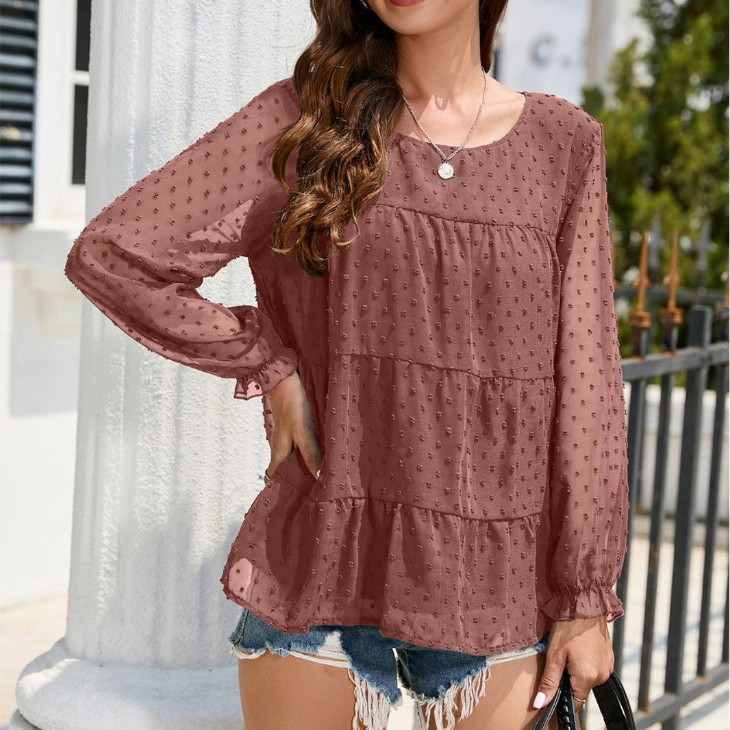 Damenbluse aus transparentem Chiffon in Braun, mit langen Ärmeln und Punktmuster. Perfekt für Sommermode und lässige Outfits.