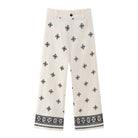 Weiße Damenhose mit schwarzem Ethno-Muster, weites Bein, Baumwolle, modisch, bequem, ideal für Sommer, Freizeitkleidung, Boho-Stil.