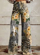 Damenhose mit Blumen- und Leopardenmuster, weites Bein, modisch, trendig, ideal für Herbstmode, auffälliges Design, bequem und stilvoll.