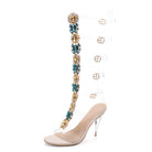 Eleganter Damen-High-Heel mit transparentem Riemen und funkelnden Edelsteinen, ideal für besondere Anlässe. Modischer Schuh, glamouröser Look.
