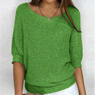 Grüner Damenpullover mit Rundhalsausschnitt, dreiviertel Ärmel, lässiger Strick, modisch, bequem, ideal für Frühling und Herbst.