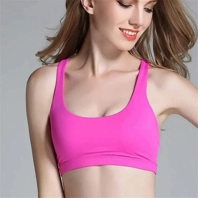 Atmungsaktiver Sport-BH in Rosa, ideal für Fitness und Yoga. Bequemer Sitz, feuchtigkeitsableitend, perfekt für aktive Frauen.