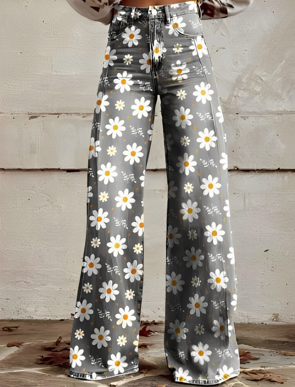 Graue Schlaghose mit Gänseblümchenmuster, modisch und retro, ideal für trendige Outfits. Perfekt für Frühlings- und Sommermode.
