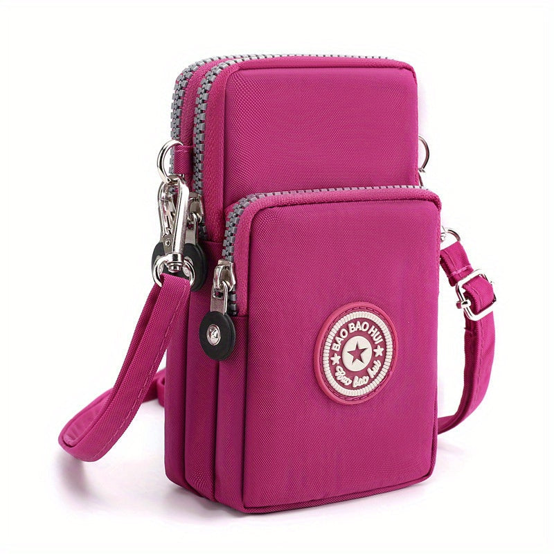 Stylische pinke Umhängetasche mit zwei Reißverschlussfächern und verstellbarem Gurt. Perfekt für Damen, die modische Accessoires lieben.