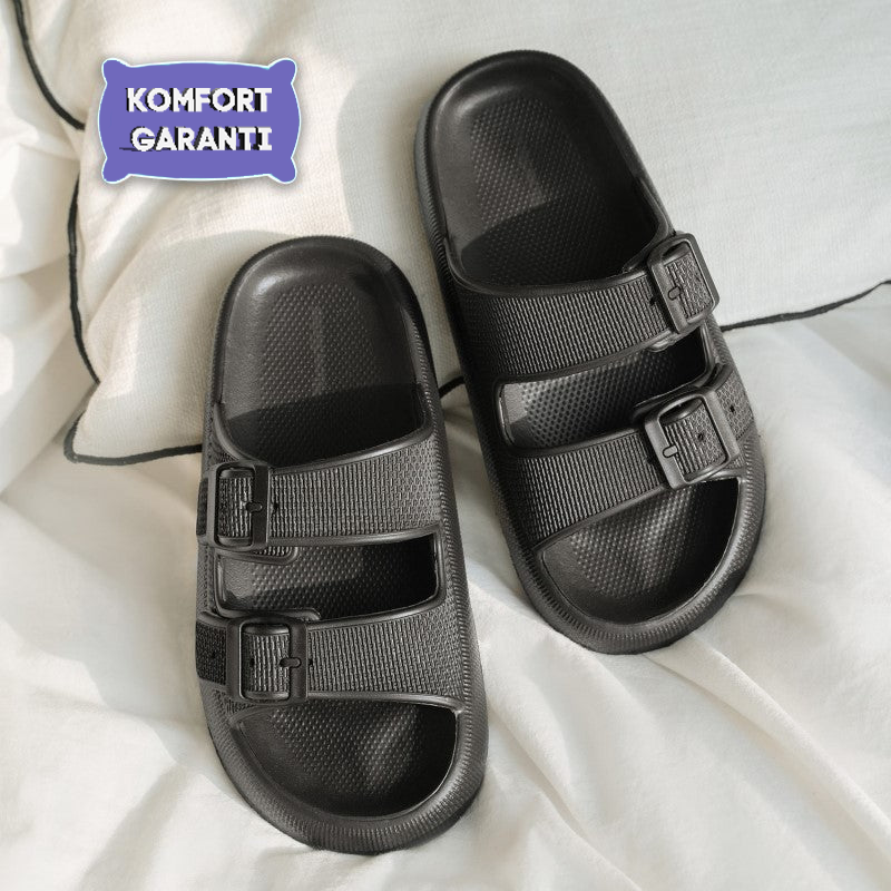 Schwarze Sandalen mit zwei verstellbaren Riemen, ideal für Komfort und Stil. Perfekt für den Sommer. Hochwertige Materialien, langlebig und bequem.