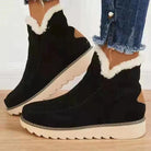 Schwarze Damenstiefeletten aus Baumwolle mit runder Spitze und flauschigem Futter, ideal für Herbstmode. Bequeme, stilvolle Schuhe.