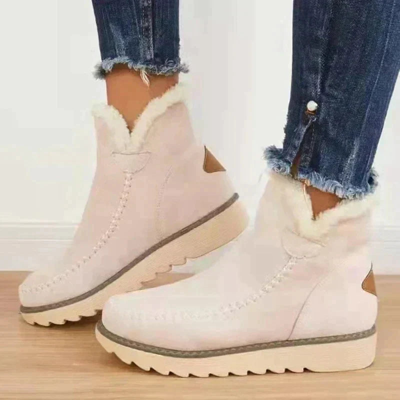 Damen Winterstiefel aus Baumwolle, rund, beige, mit Fellfutter. Bequeme, warme Schuhe für kalte Tage. Perfekt für modische Winteroutfits.