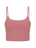 Rosa Crop-Top mit Spaghettiträgern, nahtloses Design, ideal für Sommermode, Damenbekleidung, bequem und stilvoll, vielseitig kombinierbar.