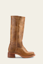 Damenstiefel aus braunem Leder, knöchelhoch, mit Blockabsatz. Perfekt für Herbstmode, langlebig und stilvoll. Ideal für urbane Outfits.