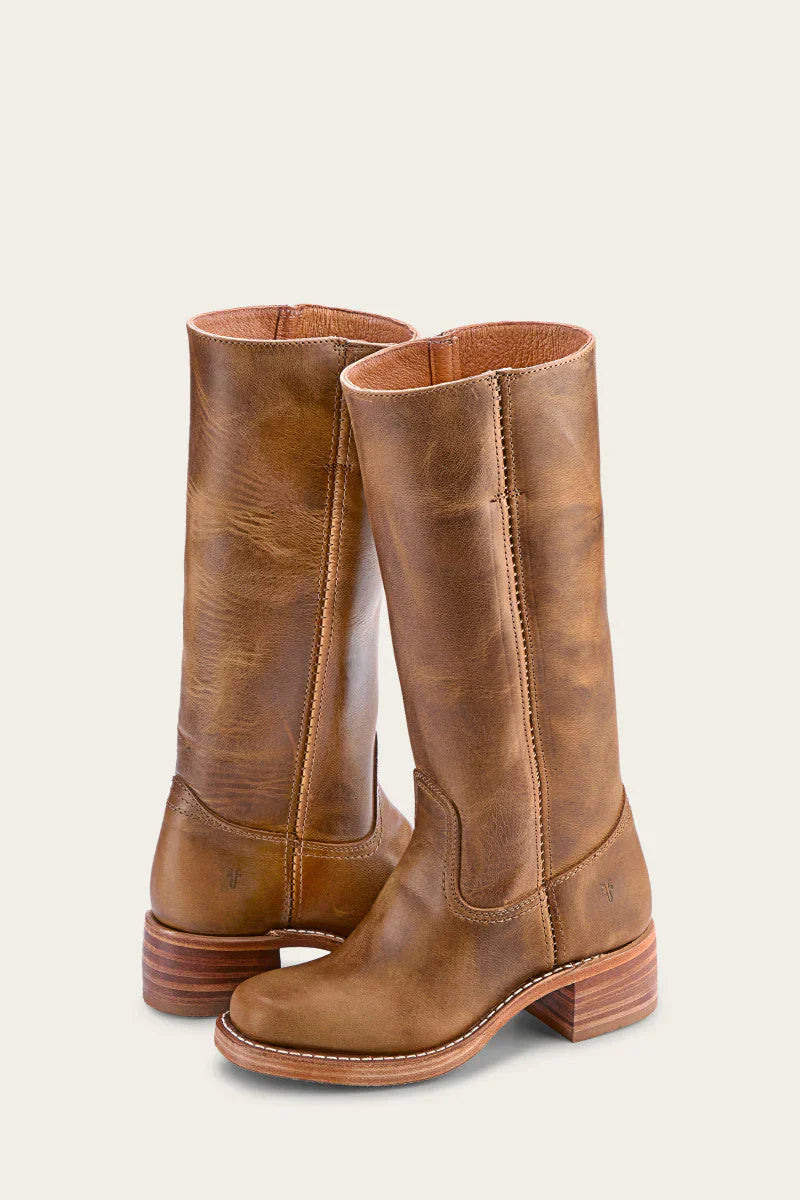 Damenstiefel aus braunem Leder, knöchelhoch, mit Blockabsatz. Perfekt für Herbstmode, langlebig und stilvoll. Ideal für Outdoor-Aktivitäten.