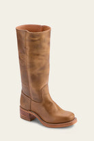 Damenstiefel aus dunkelbraunem Leder, knöchelhoch mit Blockabsatz. Perfekt für Herbstmode, langlebig und stilvoll. Ideal für Outdoor-Aktivitäten.