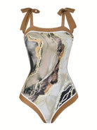 Eleganter Badeanzug mit abstraktem Marmor-Design, verstellbaren Trägern und hochwertigem Stoff. Perfekt für stilvolle Strandmode und Sommertrends.