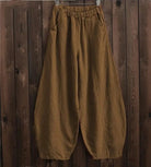 Weite braune Leinenhose für Mädchen in Übergröße, ideal für lässige Mode. Bequeme Passform, elastischer Bund, perfekt für den Alltag.