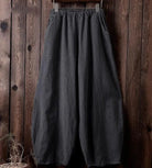 Weite schwarze Leinenhose für Mädchen in Übergröße, lässig und bequem, ideal für modische Outfits. Perfekt für Freizeit und Alltag.