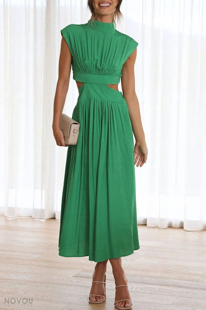 Grünes, elastisches Kleid mit Cut-Outs, ärmellos, knielang. Perfekt für Sommermode, elegante Anlässe, stilvolle Damenbekleidung.