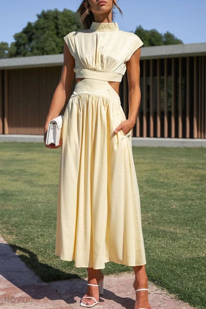 Elegantes gelbes Maxikleid mit elastischem Bund, ärmellos, ideal für Sommermode. Perfekt für stilvolle Anlässe und Freizeitkleidung.