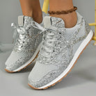 Silberne Glitzer-Sneaker für Damen, modisch und bequem, ideal für Freizeit und Sport. Trendige Turnschuhe mit funkelndem Design und rutschfester Sohle.