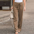 Damen Leinenhose in Beige, locker geschnitten mit Kordelzug, ideal für Sommermode. Perfekt kombinierbar mit lässigen Outfits und Sandalen.