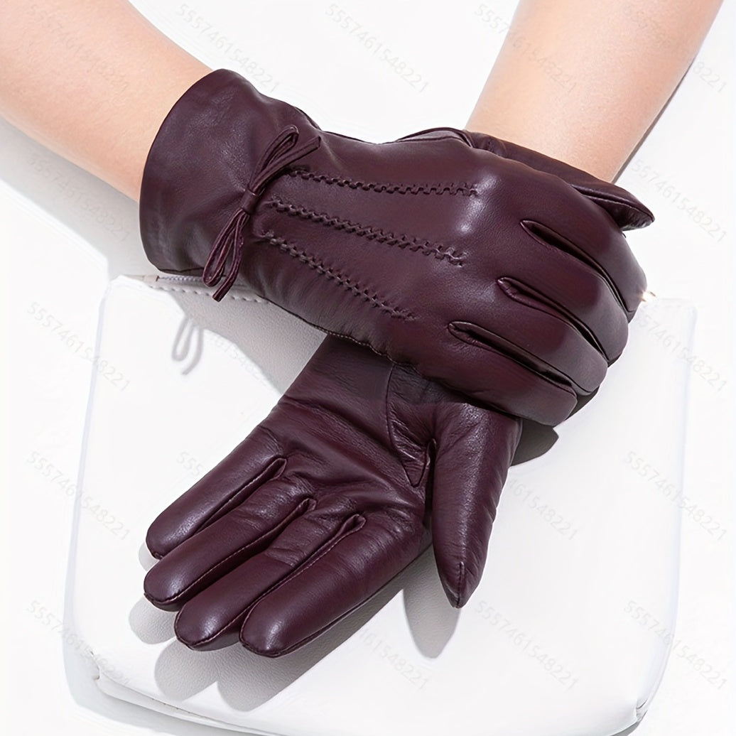 Damenhandschuhe aus braunem Leder, elegant, warm, modisch, mit Ziernähten und Schleife.