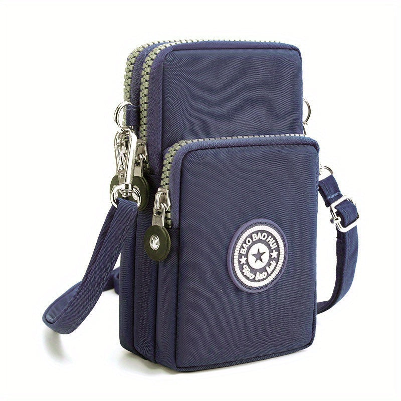 Kompakte, blaue Umhängetasche mit zwei Reißverschlussfächern und verstellbarem Schultergurt. Ideal für Reisen und Alltag. Stylisch und praktisch.