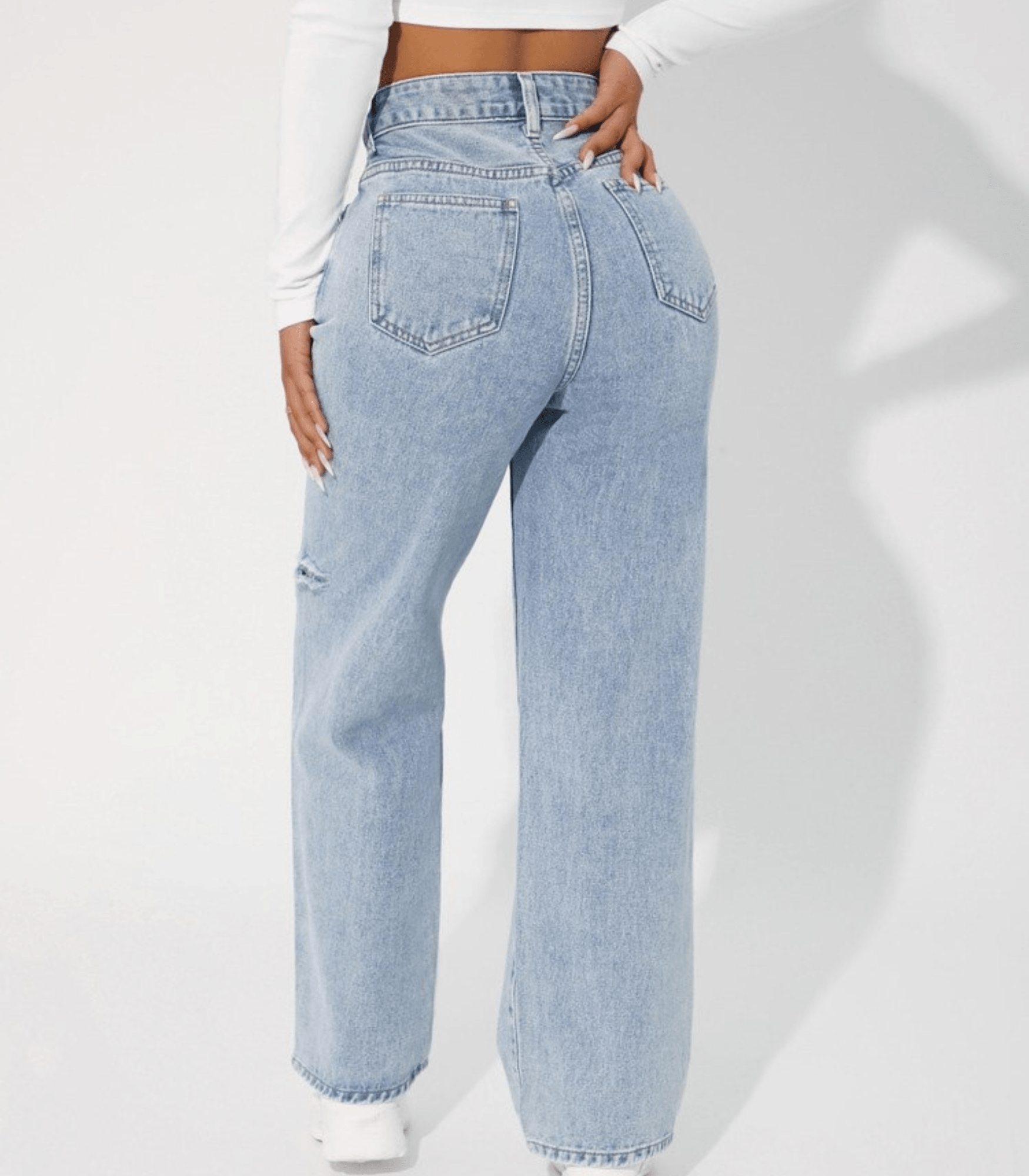 Damen-Jeans mit hoher Taille, hellblau, weites Bein, modische Löcher, trendige Denim-Hose, ideal für lässige Outfits und Streetwear.