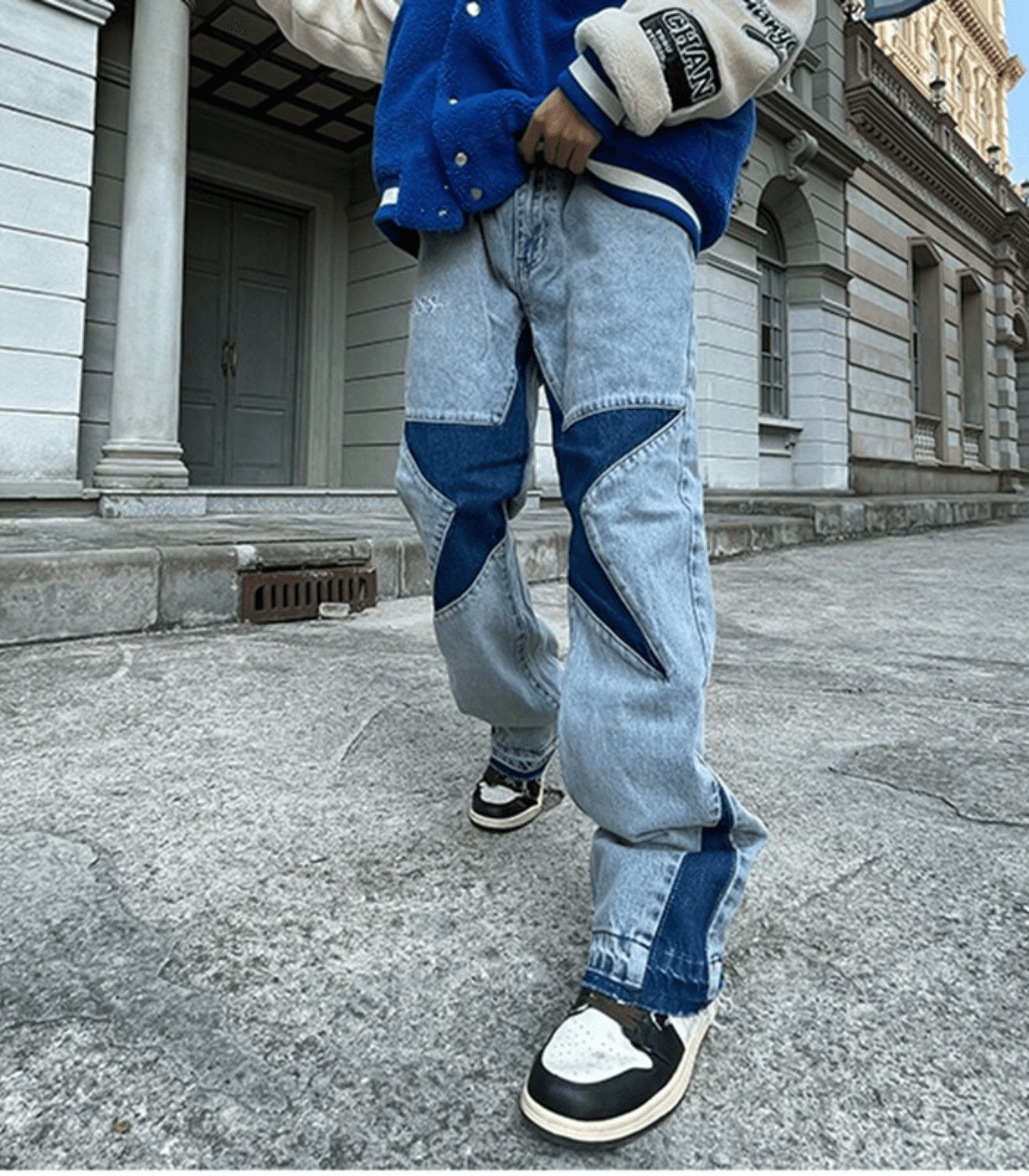 Denim-Jeans mit aufgenähtem Stern, lässiger Streetwear-Stil, ideal für trendige Mode-Looks. Perfekt für urbane Outfits und modische Akzente.