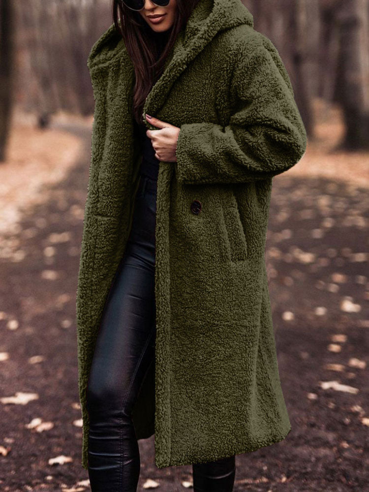 Damen Wintermantel aus grünem Teddyfell, warm und stilvoll, ideal für kalte Tage. Perfekt für modische Herbst- und Winteroutfits.
