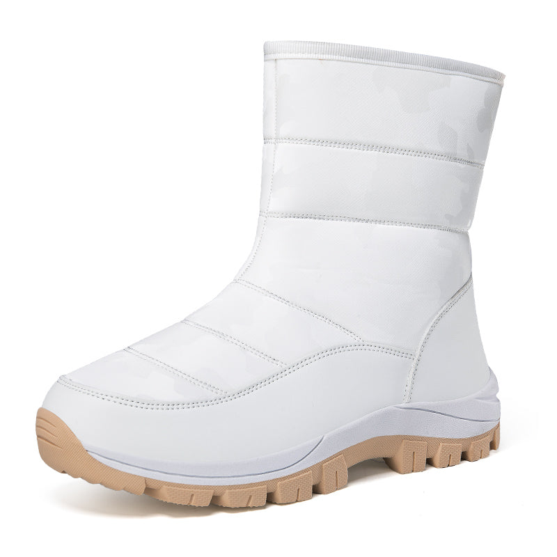 Weiße Winterstiefel mit rutschfester Sohle, ideal für kalte Wetterbedingungen. Perfekt für Outdoor-Aktivitäten und modische Winteroutfits.