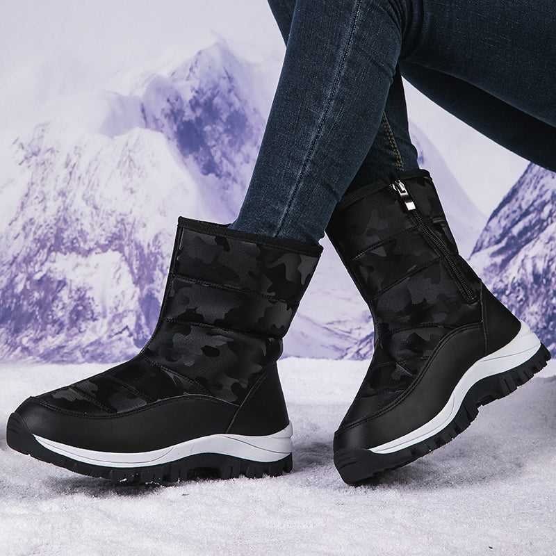 Damen Winterstiefel, schwarz, mit Camouflage-Muster, rutschfeste Sohle, ideal für Outdoor-Aktivitäten im Schnee, modisch und warm.