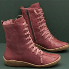 Damenstiefel aus Leder in Rosa mit Schnürung und Reißverschluss, bequeme Sohle, modisch, ideal für Herbst und Winter. Hochwertige Schuhe.