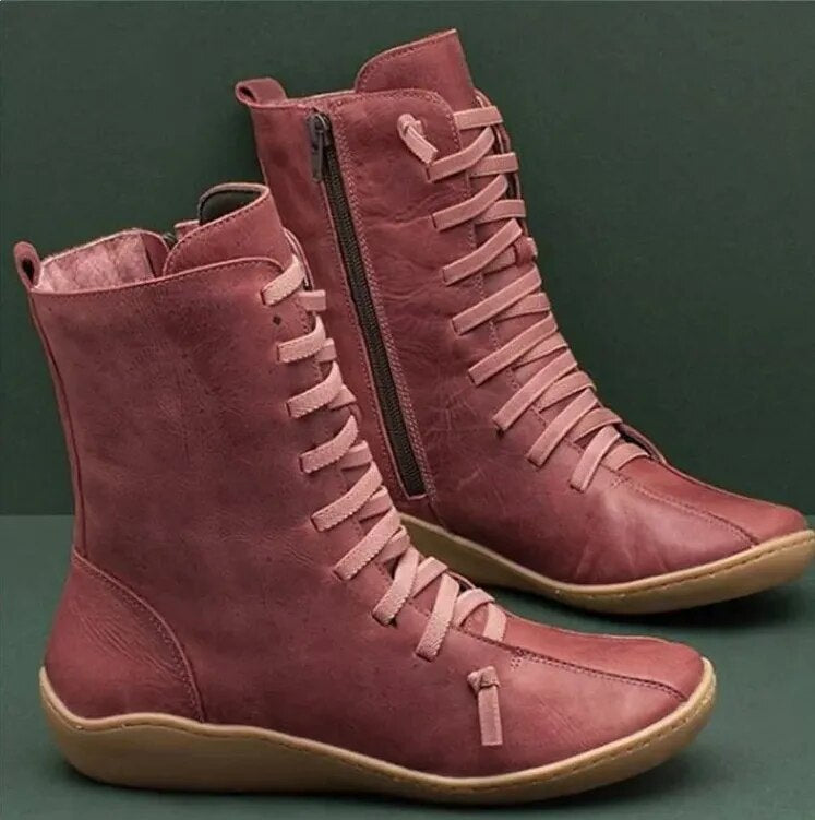 Damenstiefel aus Leder in Rosa mit Schnürung und Reißverschluss, bequeme Sohle, modisch, ideal für Herbst und Winter. Hochwertige Schuhe.
