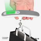 Digitale Kofferwaage, grau, mit LCD-Display, tragbar, für präzises Wiegen von Gepäck.