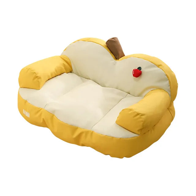 Gelbes Apfel-Sofa für Kinder, weiches Plüschmaterial, gemütliche Sitzgelegenheit, Spielzimmer.
