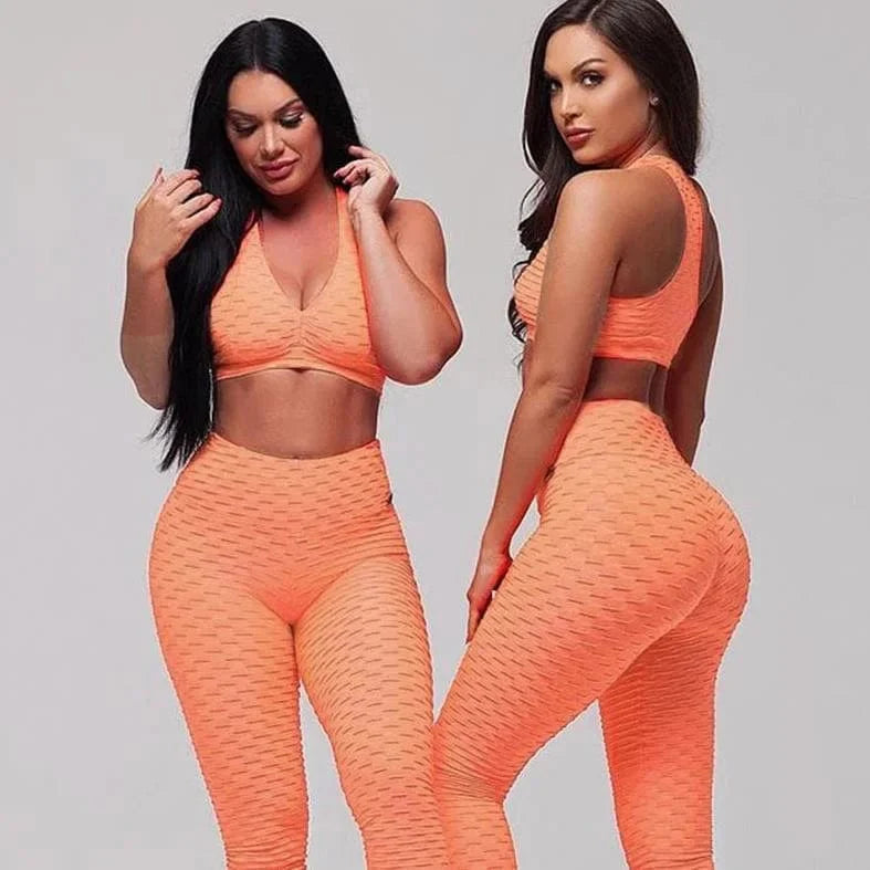 Damen Sport-Set in leuchtendem Orange, V-Ausschnitt, nahtloses Design, ideal für Fitness und Yoga. Modische Sportbekleidung für Frauen.