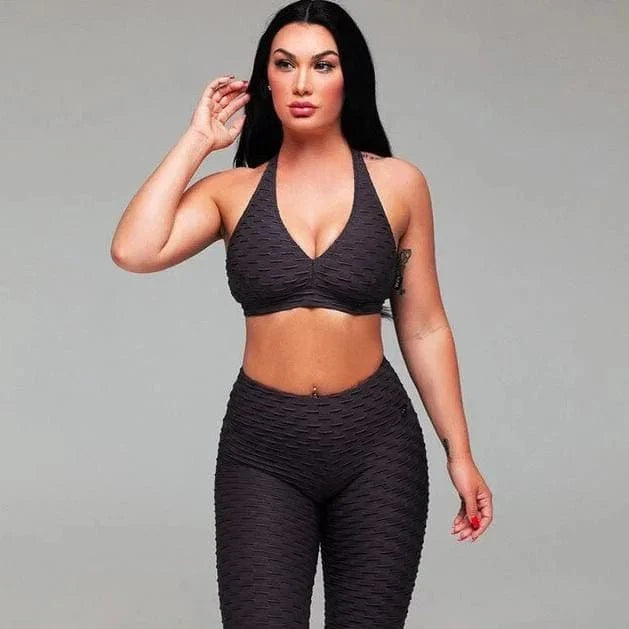 Schwarzes Sport-Set mit V-Ausschnitt für Damen, ideal für Fitness und Yoga. Bequemes, atmungsaktives Material, perfekte Passform.