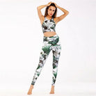 Damen-Sportset mit Blumenmuster in Grün, bestehend aus Leggings und Top. Ideal für Yoga, Fitness und Freizeit. Hochwertige Sportbekleidung.