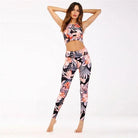Damen-Sportset mit Blumenmuster in Violett, bestehend aus Leggings und Crop-Top. Perfekt für Yoga, Fitness und Freizeit. Hochwertige Sportbekleidung.