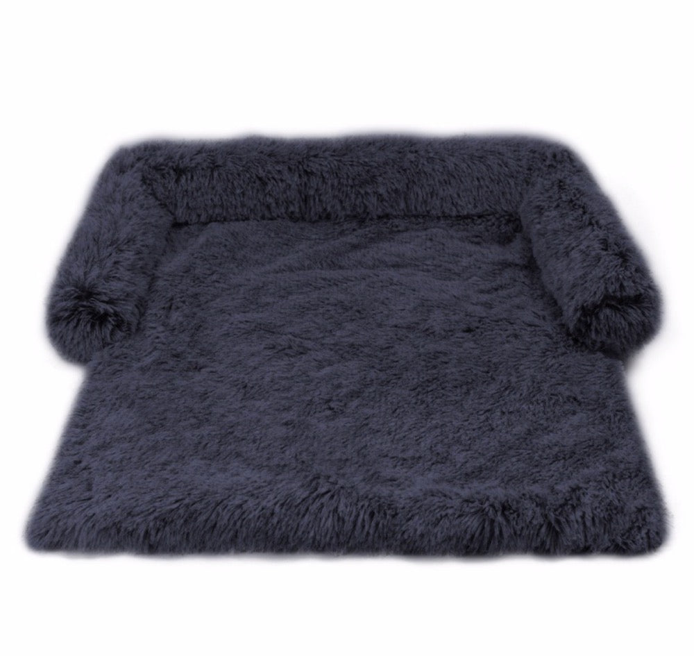 Graues, flauschiges Hundebett, rechteckig, aus weichem Material, ideal für Haustierkomfort.
