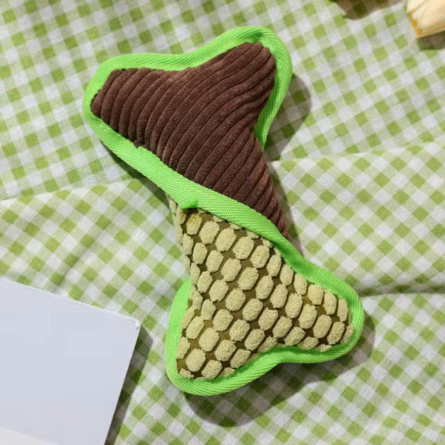 Kauspielzeug für Hunde in Knochenform, zweifarbig, auf grün-weiß kariertem Hintergrund. Ideal für Haustiere, robust und langlebig.