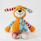Bunter Plüschhund mit gestreiften Ohren und Beinen, ideal als Kuscheltier für Kinder. Weiches Spielzeug, farbenfrohes Design, Geschenkidee.