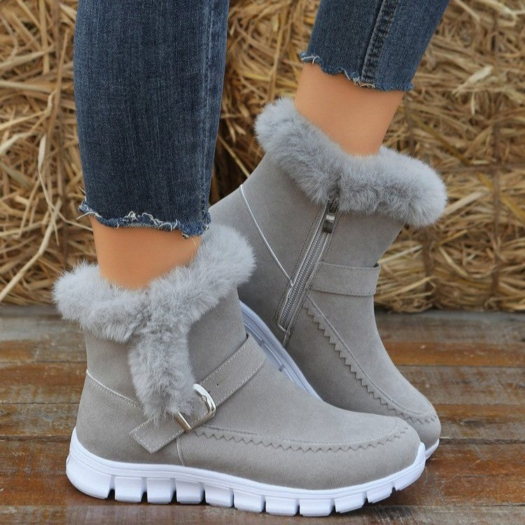 Damen Winterstiefel, grau, mit Kunstfell, Reißverschluss und Schnalle. Bequeme, warme Schuhe für kalte Tage. Ideal für modische Winteroutfits.