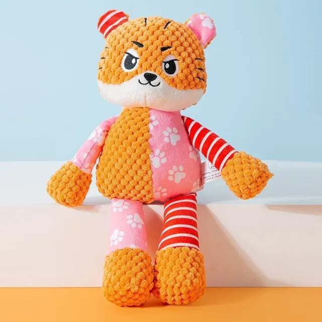 Plüsch-Tiger Stofftier, orange-rosa, mit gestreiften und gepunkteten Mustern, ideal als Kuscheltier für Kinderzimmer oder Geschenkidee.