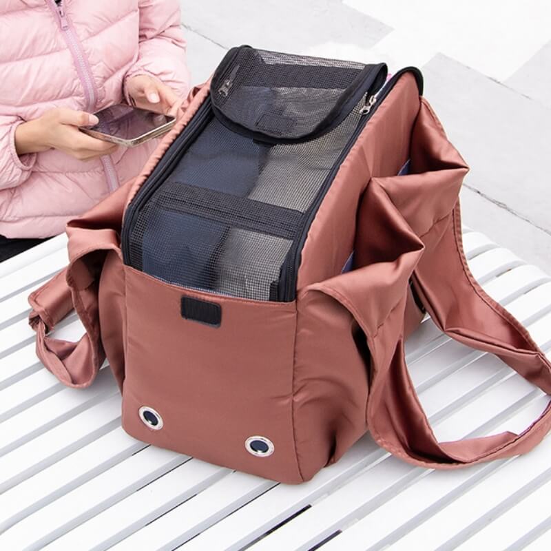Braune tragbare Schultertasche für Haustiere, atmungsaktiv, ideal für Reisen.