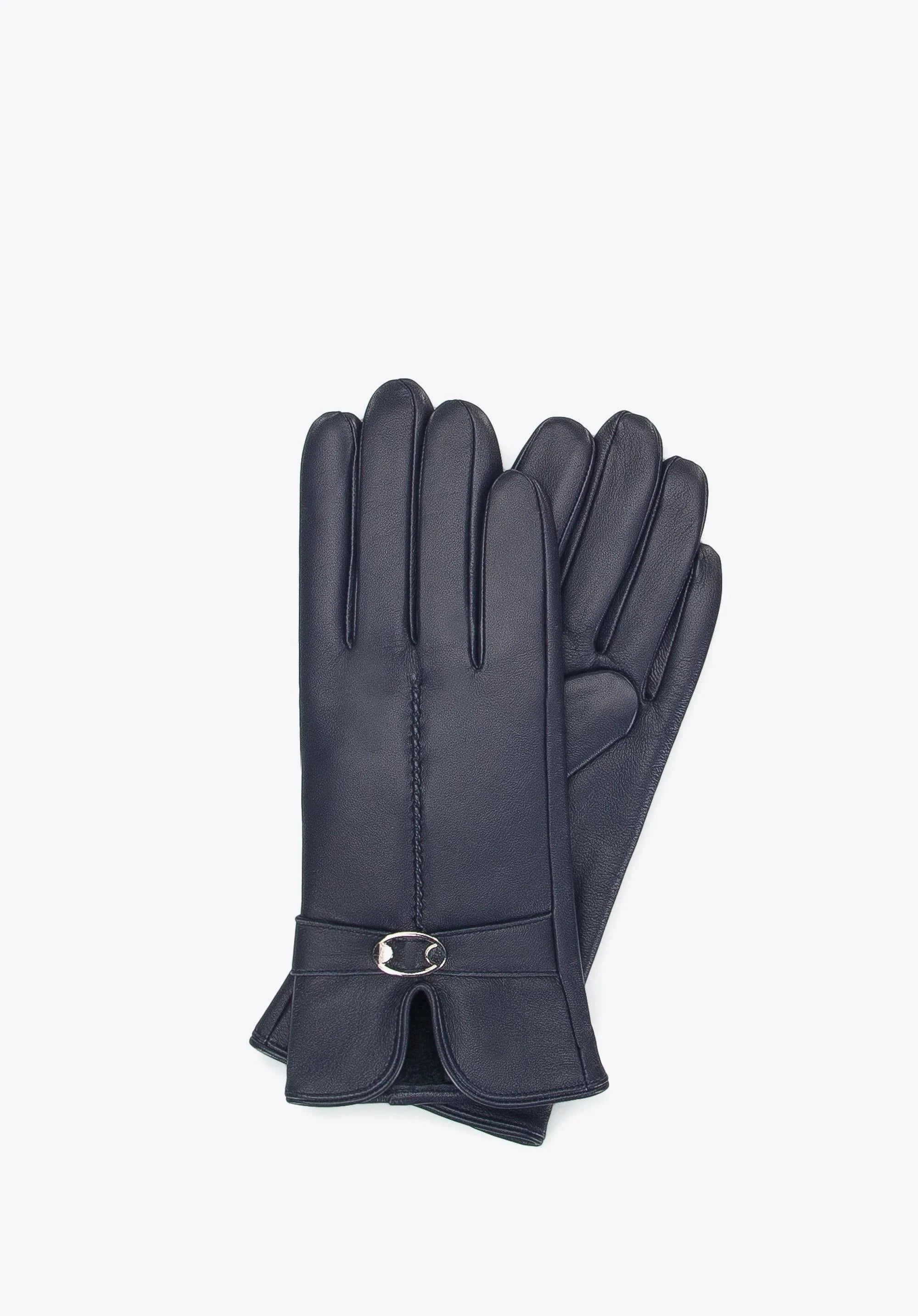 Elegante schwarze Lederhandschuhe für Damen, ideal für Wintermode. Hochwertiges Material, stilvolles Design, perfekte Passform.