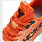 Orange Trainingsschuh, atmungsaktives Mesh, sportliches Design, ideal für Fitness und Laufen.
