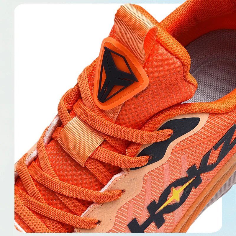 Orange Trainingsschuh, atmungsaktives Mesh, sportliches Design, ideal für Fitness und Laufen.