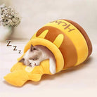 Katzenbett in Honigtopf-Design, gemütlich und weich, ideal für alle Jahreszeiten. Perfekt für Katzenliebhaber, die Komfort und Stil suchen.
