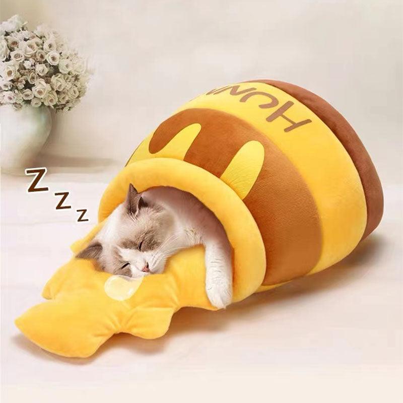 Katzenbett in Honigtopf-Design, gemütlich und weich, ideal für alle Jahreszeiten. Perfekt für Katzenliebhaber, die Komfort und Stil suchen.